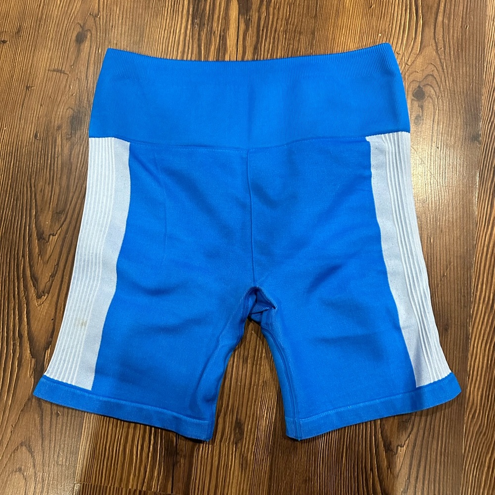 Blue biker shorts. Mid thigh length